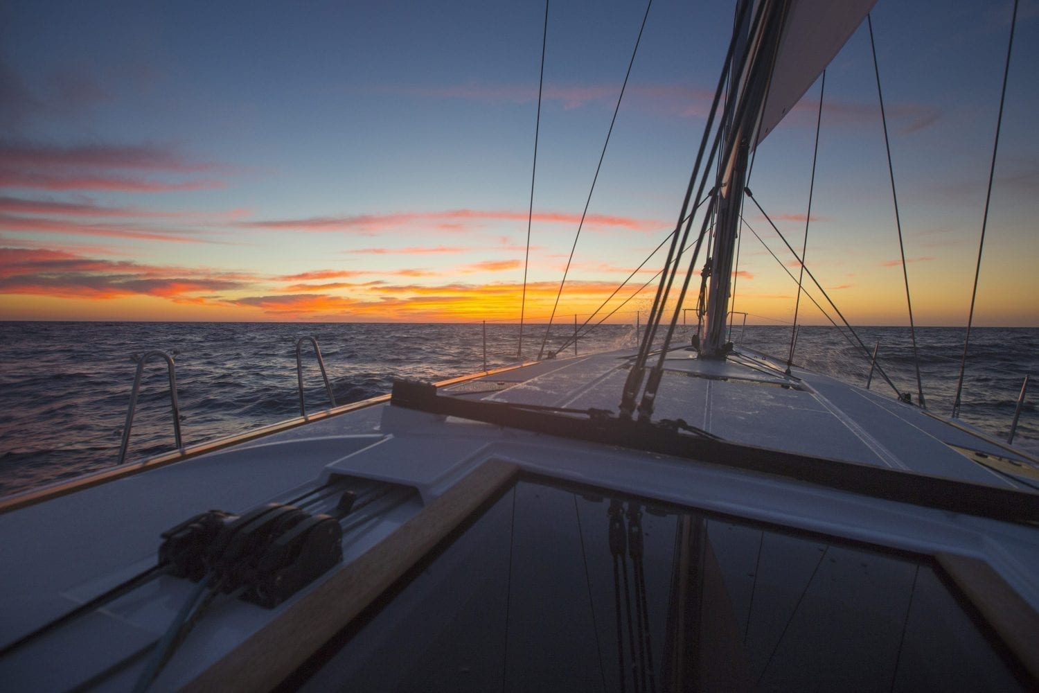 Sunrise sailing offshore from Miami to Bimini, Bahamas on the Jeanneau 509.