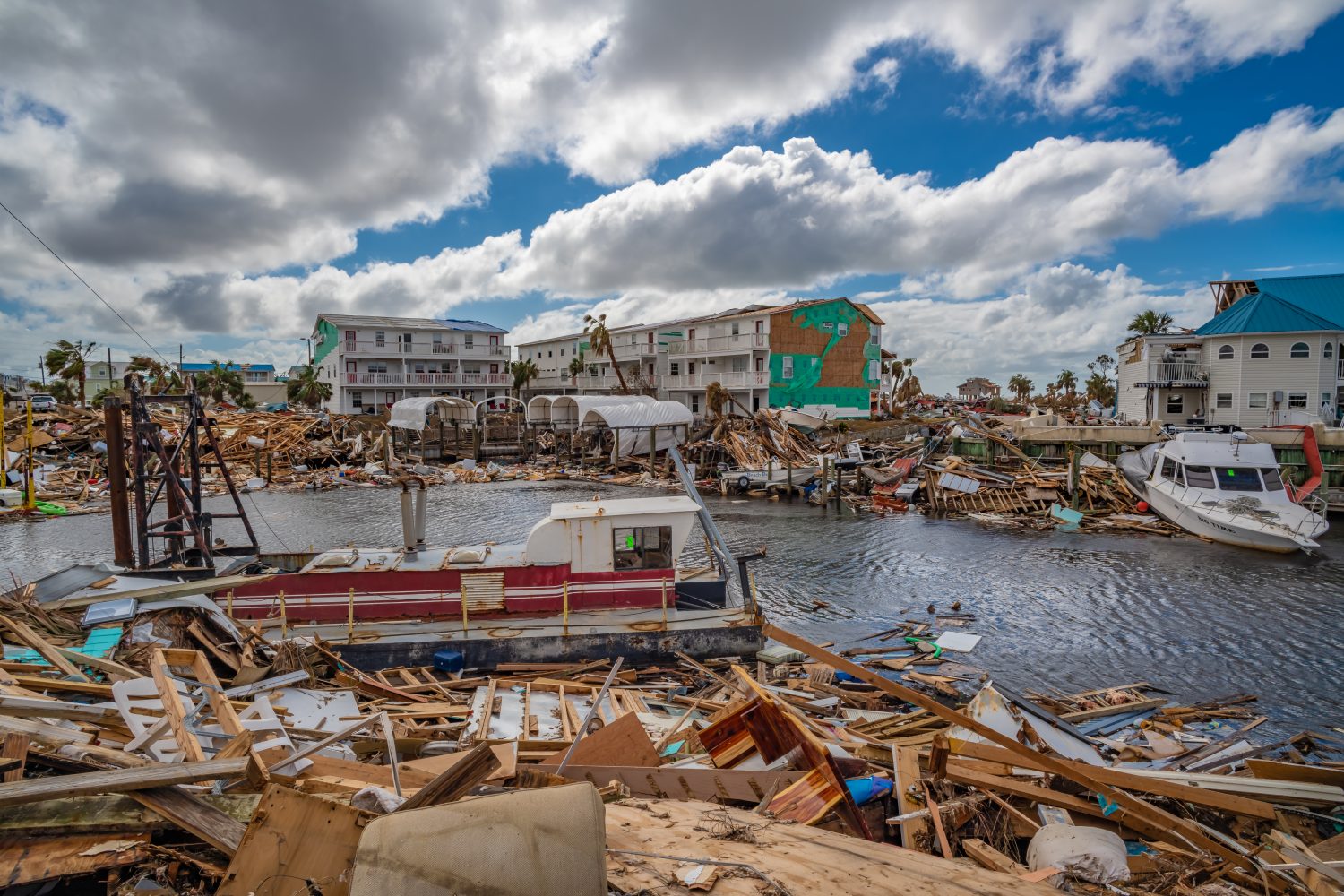 Damaged homes, condos, and docks in a coastal canal community in Mexico Beach following Hurricane Michael