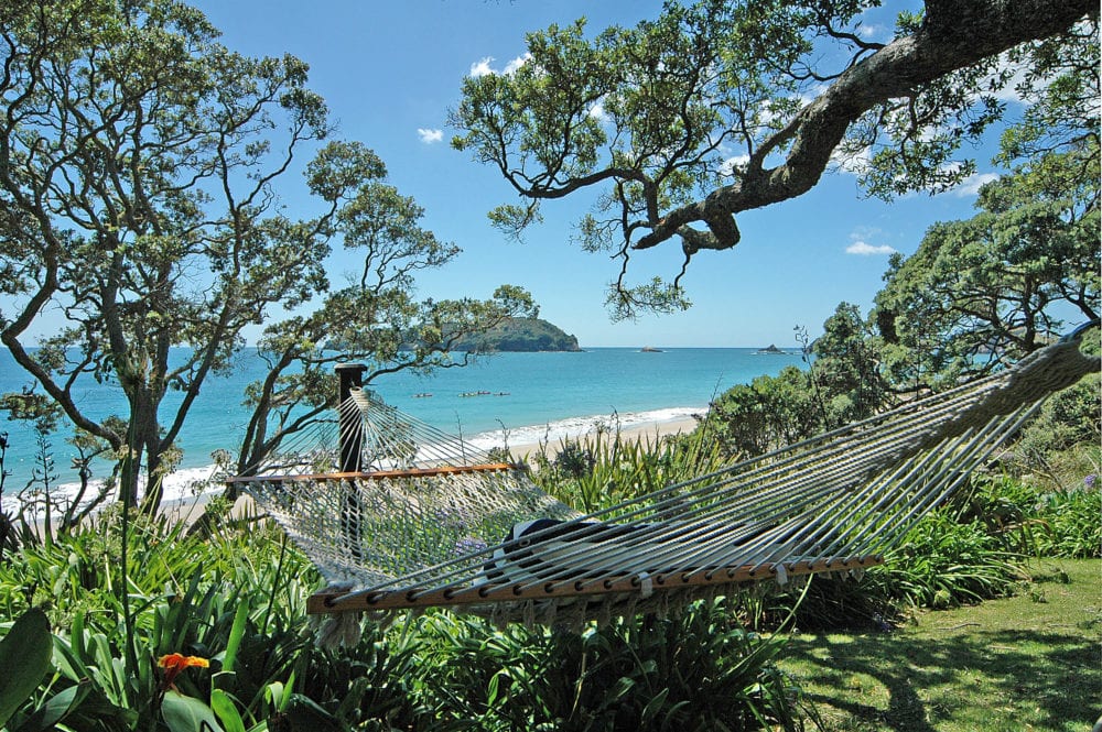 Hammock and view at Preston’s original holiday home in Hahei, which she no longer owns