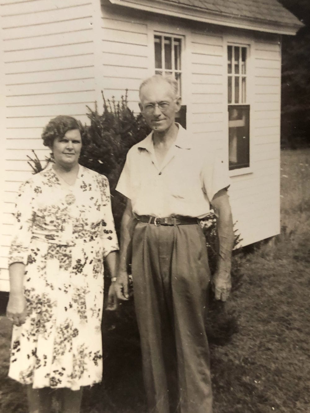 Miriam and Herbert Plimpton in front of New England Village