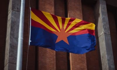 Arizona state flag outside the legislature buildings at the state capitol